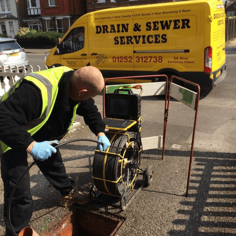 Drainage engineers carrying out a CCTV drain survey on a commercial property.